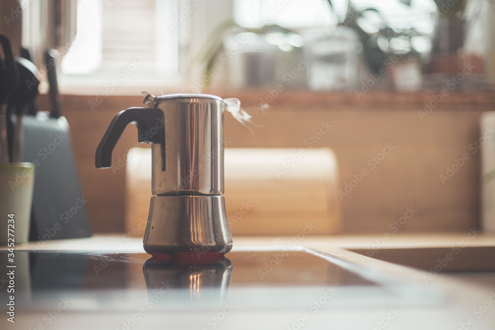 Making coffee in the morning: Italian coffee cooker vintage stove Making coffee in the morning: Italian coffee cooker vintage stove