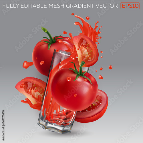 Glass with tomato juice and red tomatoes.