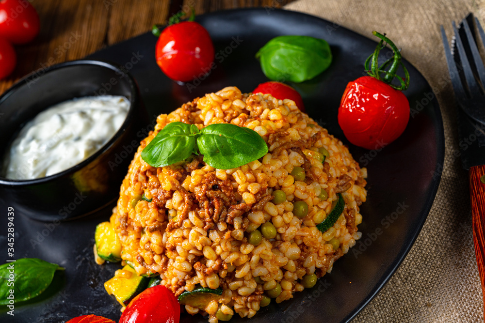 rustic bulgur fried with minced meat and vegetables