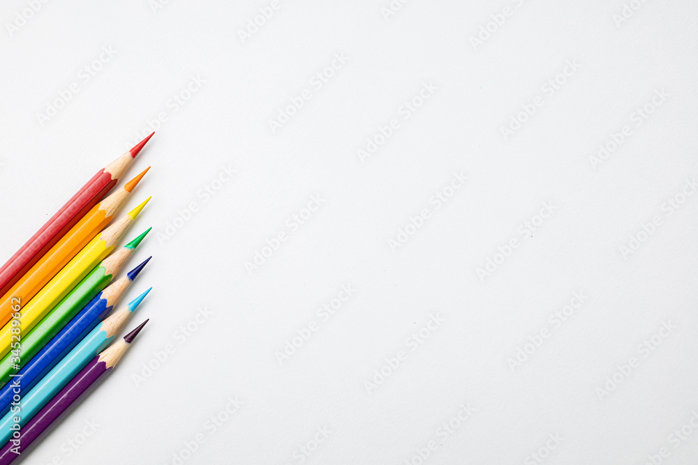 Wooden pencils of multicolor as banner concept of work from home with copy space for runaround or wraparound text.Work at home concept. Wooden pencils of multicolor as banner concept of work from home with copy space for runaround or wraparound text.Work at home concept.