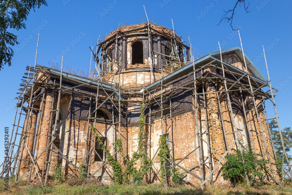 Ancient ruined orthodox temple. The concept of religious architecture, Easter and various religious holidays and denominations in Ukraine. The revival of Orthodoxy. Ancient ruined orthodox temple. The concept of religious architecture, Easter and various religious holidays and denominations in Ukraine. The revival of Orthodoxy.