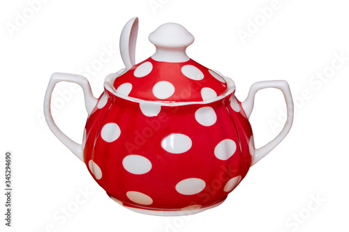 Sugar bowl with spoon on a white background,red ceramic tableware for red sugar isolated on white background