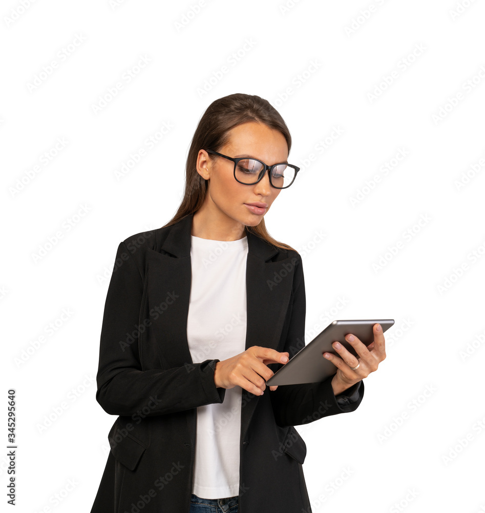 Woman in glasses using tablet computer, isolated Woman in glasses using tablet computer, isolated