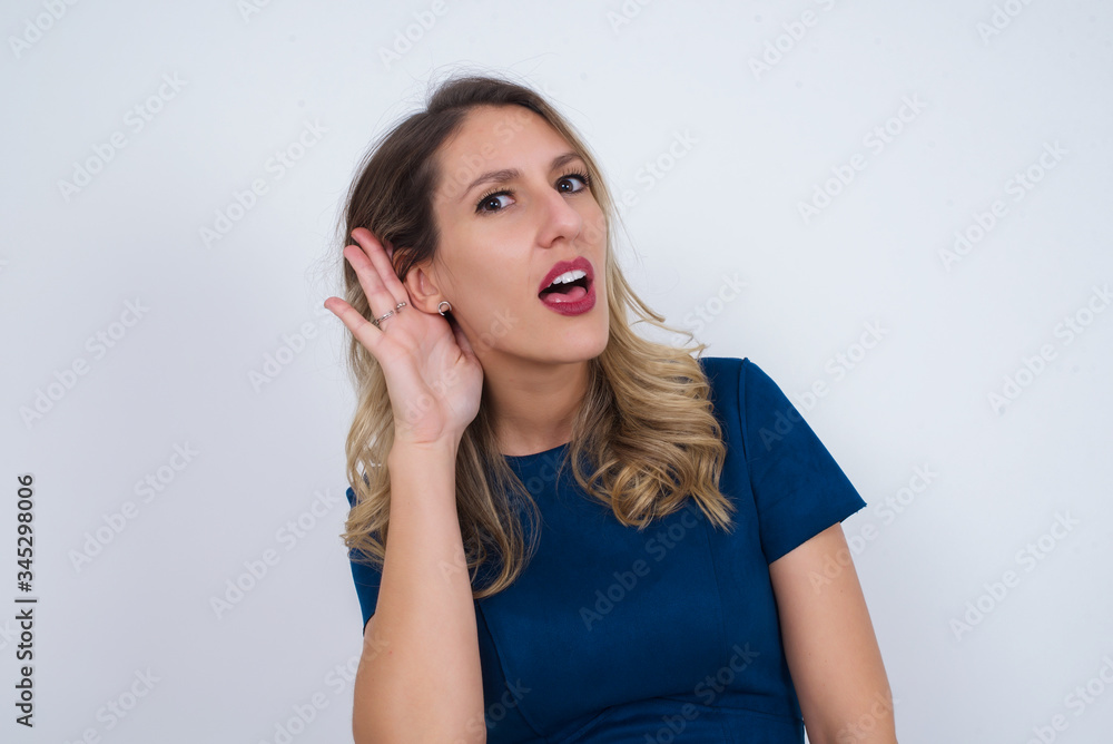 Oh my God! Funny astonished European female opening mouth widely, raising eyebrows and popping eyes out in surprise with hand near ear trying to listen to gossips. Oh my God! Funny astonished European female opening mouth widely, raising eyebrows and popping eyes out in surprise with hand near ear trying to listen to gossips.