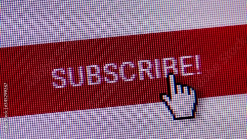 Subscribe button closeup. Clicking the button Subscribe on computer screen