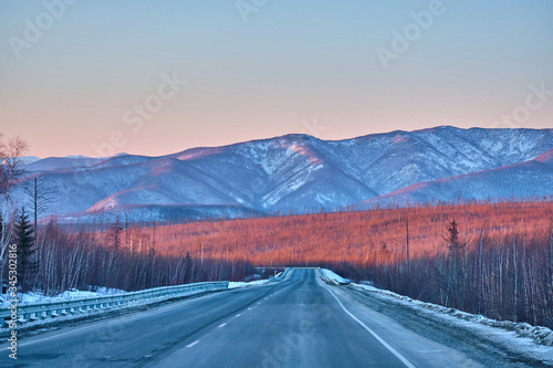Sunset among the mountains on the road Lidoga-Vanino Khabarovsk territory.
