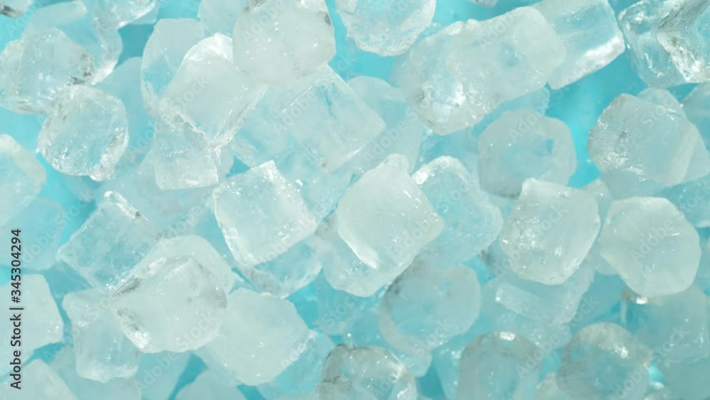Super slow motion of ice cubes explosion, top view shot. Filmed on very high speed cinema camera, 1000fps. Super slow motion of ice cubes explosion, top view shot. Filmed on very high speed cinema camera, 1000fps.