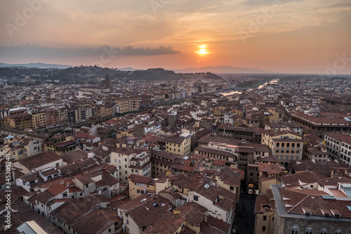 Aerial view of Florence at sunset with Arno river in background