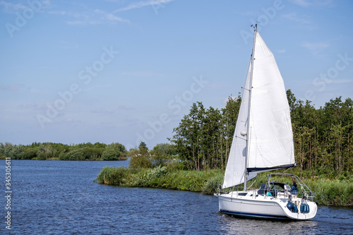 sailing boat in Dutch waterscape