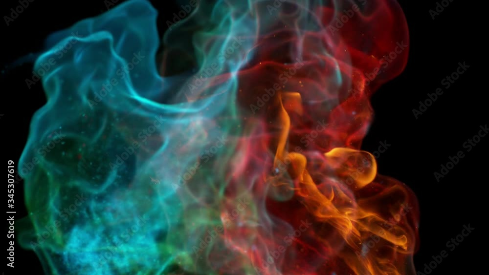 Super slow motion of coloured fire blasts isolated on black background. Filmed on high speed camera, 1000 fps Super slow motion of coloured fire blasts isolated on black background. Filmed on high speed camera, 1000 fps