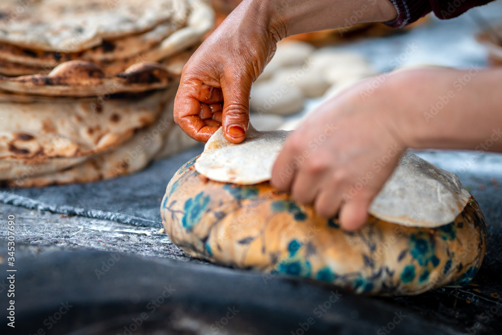 Preparation of organic tandoor bread and layered bread, one of the local flavors of Antioch