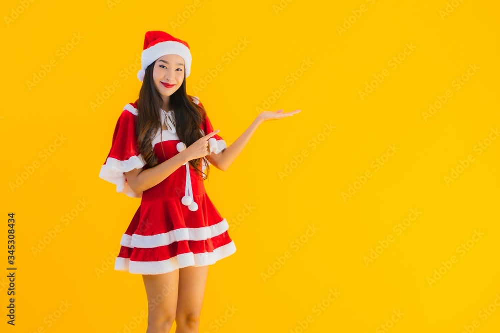 Portrait beautiful young asian woman christmas clothes and hat smile happy Portrait beautiful young asian woman christmas clothes and hat smile happy