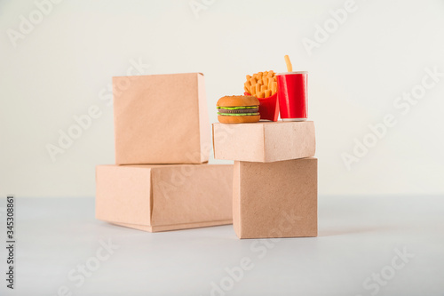 Sales of products.  A lot of boxes on a white background close-up and copy space. Fast food. The concept commerce  online shopping. Purchasing power  delivery order. E-commerce  sales and sale of good