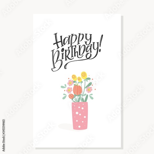Happy birthday Handwritten modern lettering with a bouquet of flowers in a vase for a greeting card.