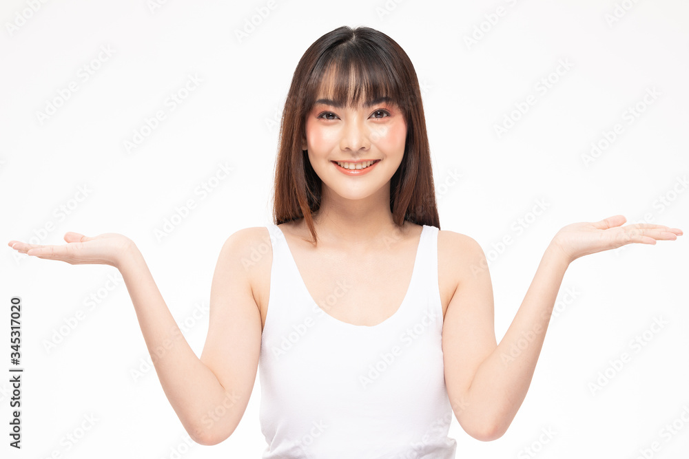 Beautiful Attractive Charming Asian young woman smile with white teeth open hand palm for display cosmetics product cheerful with healthy skin,isolated on white background,Beauty Cosmetics Concept Beautiful Attractive Charming Asian young woman smile with white teeth open hand palm for display cosmetics product cheerful with healthy skin,isolated on white background,Beauty Cosmetics Concept