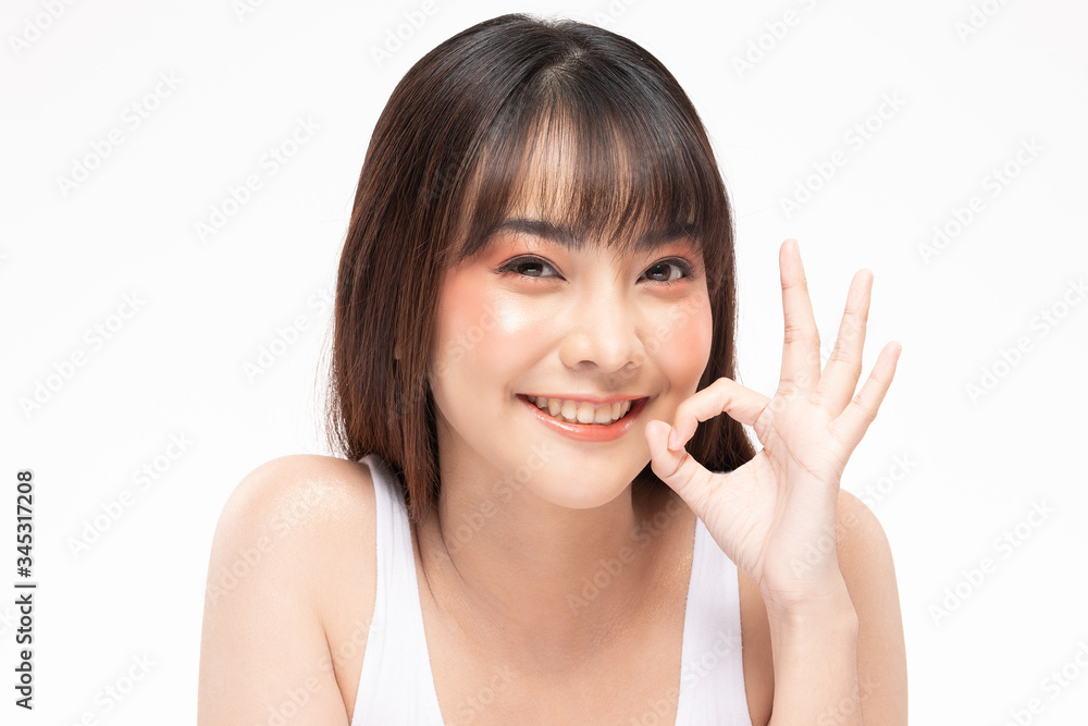 Beautiful Attractive Asian young woman smile and making okay sign feeling so happiness and confident,Isolated on white background,Beauty Concept Beautiful Attractive Asian young woman smile and making okay sign feeling so happiness and confident,Isolated on white background,Beauty Concept