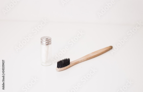 zero waste dental floss and bamboo toothbrush