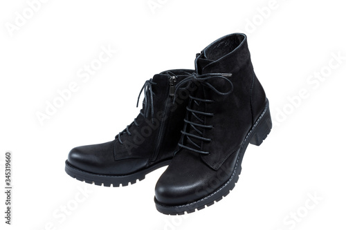 Pair of nice black ladies boots, isolated on a white background
