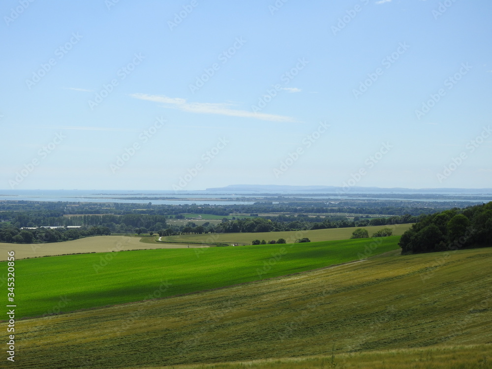 Obraz premium Light and dark green fields and landscapes