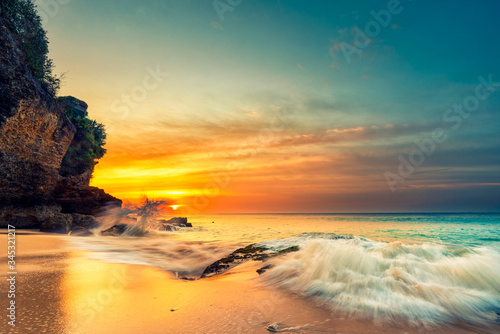 Fototapeta Naklejka Na Ścianę i Meble -  Beautiful sunset over the tropical beach