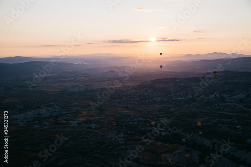 The view from above hot air balloon at sunrise at Cappadocia valley.