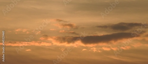 Clouds exposed by the setting sun © Rafal