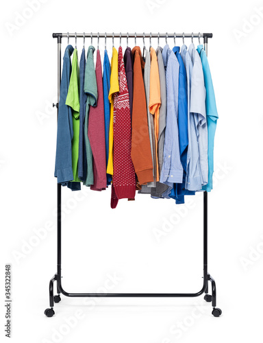 Mobile rack with casual clothes isolated on white background. File contains a path to isolation