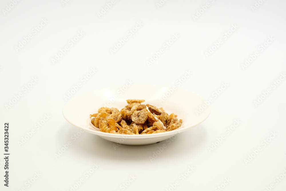 Dried shrimps, am East Asian cuisines, shots on isolated white background. Dried shrimps, am East Asian cuisines, shots on isolated white background.