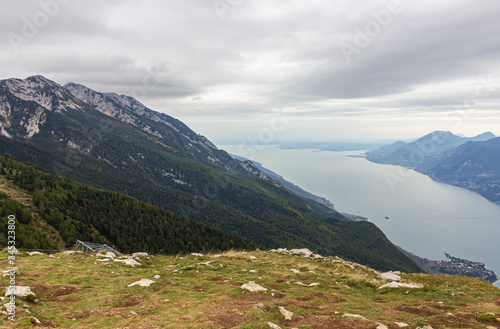 View from the heights of Monte Baldo on the Alpine mountains and Lake Garda in Veneto, northern Italy