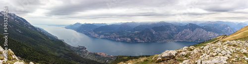 View from the heights of Monte Baldo on the Alpine mountains and Lake Garda in Veneto, northern Italy