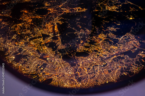 Fototapeta Naklejka Na Ścianę i Meble -  Spectacular and Beautiful Aerial View from Airplane above City of Rome in Italy Illuminated at Night. 
