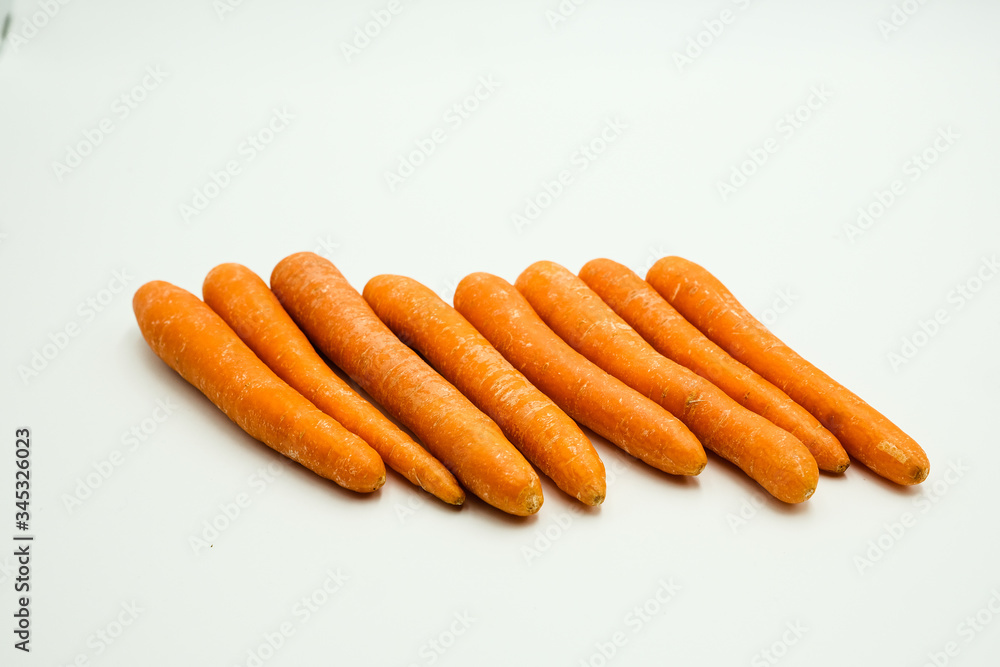Carrot or Daucus carota subsp. sativus, shots on isolated white background. Carrot or Daucus carota subsp. sativus, shots on isolated white background.
