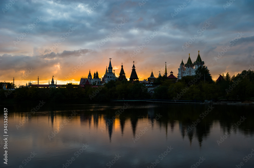 View Of The Kremlin Izmailovo Through A Silver-Grape Pond At Sunset