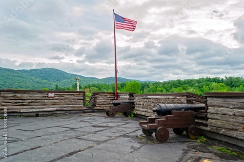 Lake George, New York. Exterior walls of wooden structure known as Fort William Henry, where wars were fought and history was made in that area of the USA.
