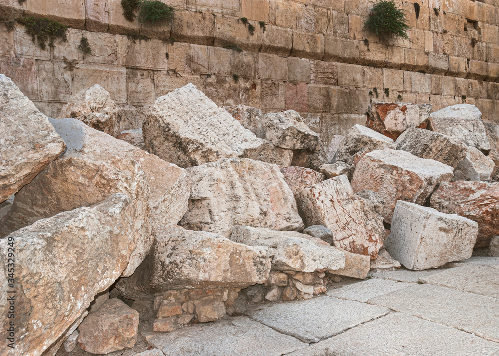 closeup of stones thrown from the second temple to the street below after the roman destruction of the temple in 70 CE at the southern section of the western wall kotel in jerusalem - obrazy, fototapety, plakaty 