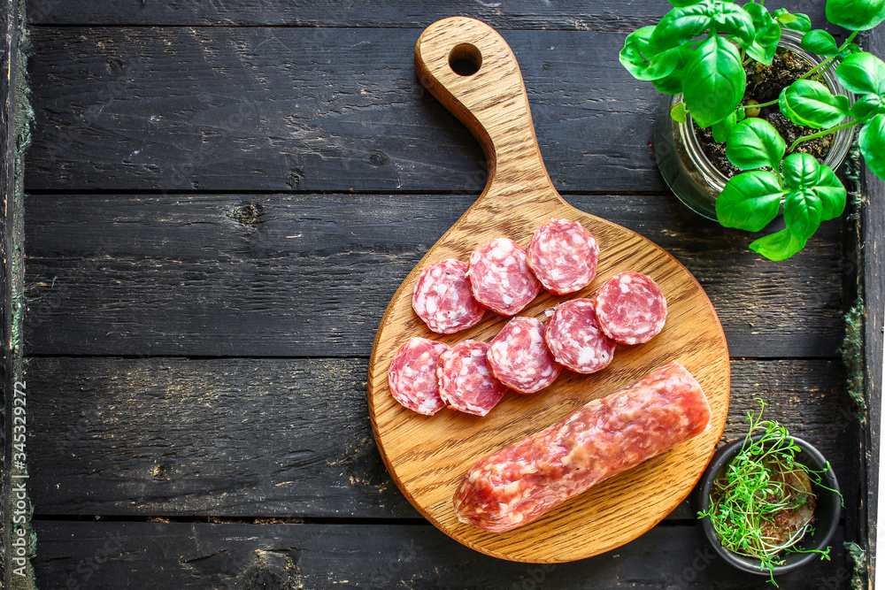  smoked sausage Fuet meat product Menu concept healthy eating. food background top view copy space for text keto or paleo organic product diet
