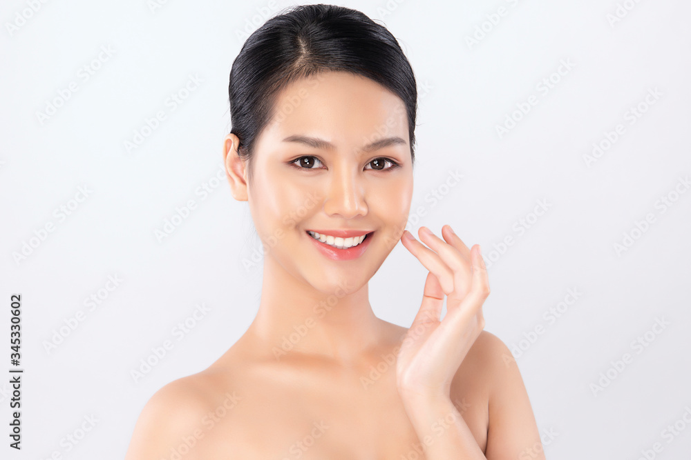 Beautiful Young Asian Woman with Clean Fresh Skin. Face care, Facial treatment, Cosmetology, beauty and healthy skin and cosmetic concept, woman beauty skin isolated on white background Beautiful Young Asian Woman with Clean Fresh Skin. Face care, Facial treatment, Cosmetology, beauty and healthy skin and cosmetic concept, woman beauty skin isolated on white background