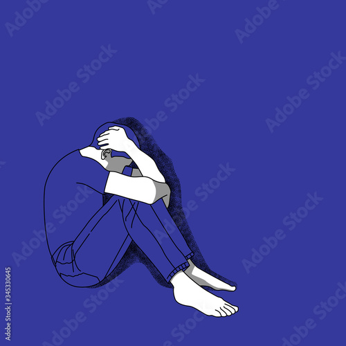 Depressed man sitting on the floor, feeling lonely or frustrated thinking about problems.