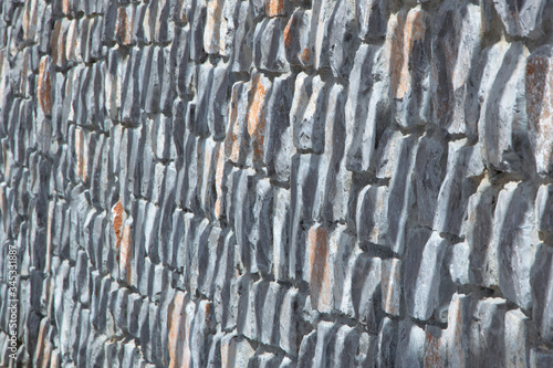Stone grey background, pattern of rocky wall