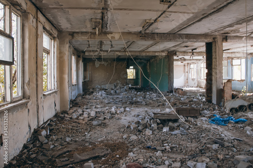 Old broken empty abandoned industrial building interior. abandoned factory © kolyadzinskaya