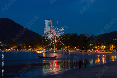 Patong beach, Phuket is a place to swim, relax and walk along the beach with fireworks at night