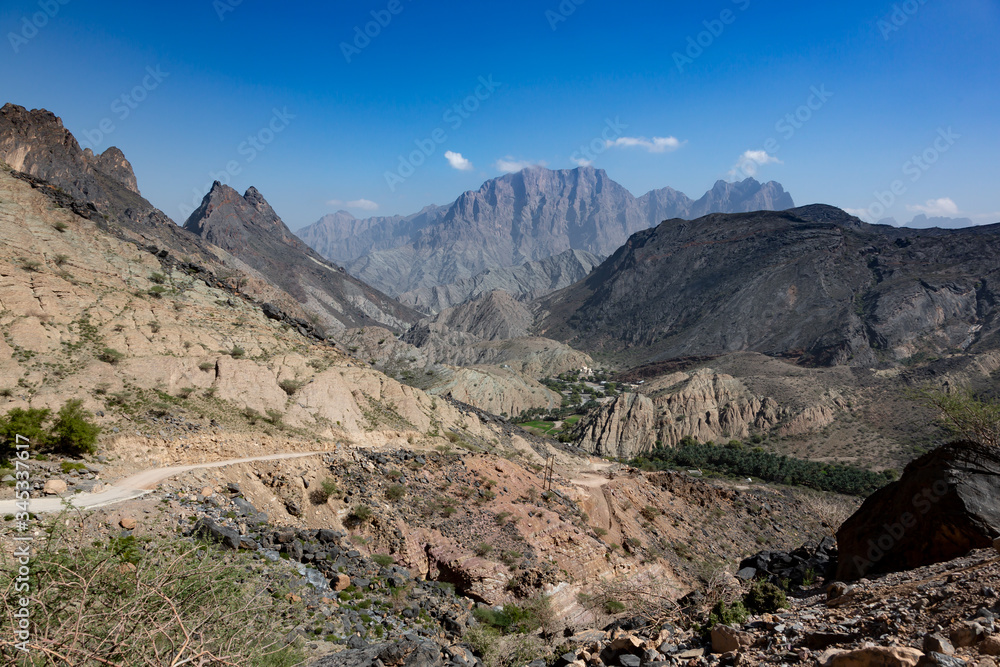 Panoramic view into Wadi Bani Awf from road crossing the Hajar mountain range in Oman