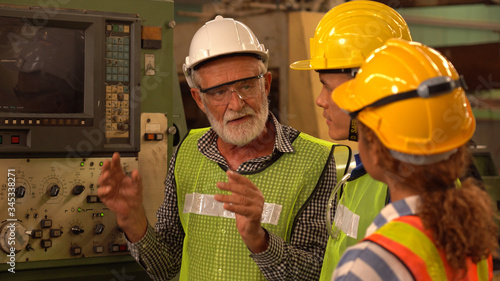 Team Of Engineers Having Discussion