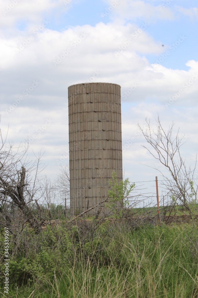 Concrete silo sits on a Kansas farm