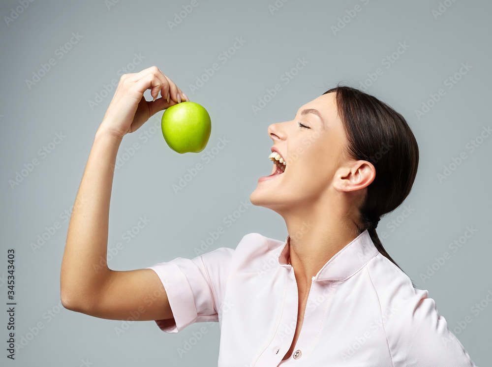 a girl with a ripe green apple a girl with a ripe green apple