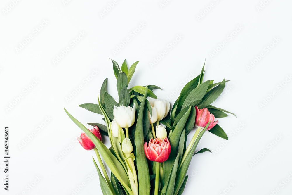 Spring flat lay composition lush bouquet of tulips Spring flat lay composition lush bouquet of tulips