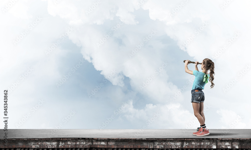 Concept of careless happy childhood with girl exploring this world Concept of careless happy childhood with girl exploring this world