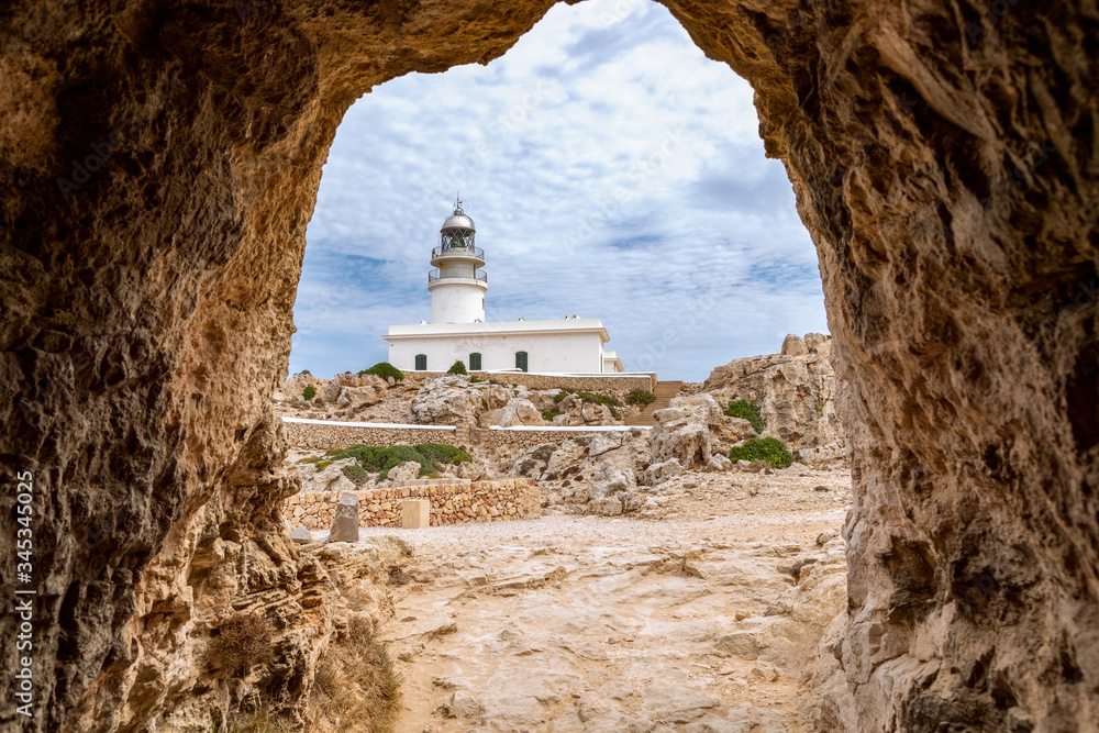 View from Cavalleria tunnel to the lighthouse (Faro de Cavalleria). Menorca, Balearic islands, Spain