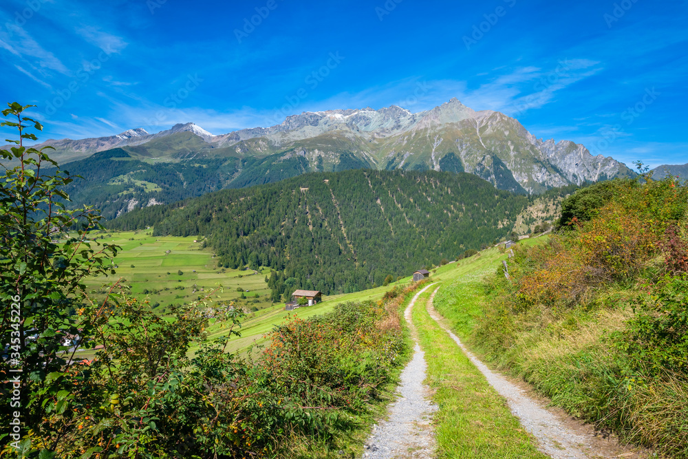 In the mountains near the Austrian village Nauders, many hiking paths can be found. It's located in the state of Tirol near Italy (connected by the Resia Pass) and the canton Graubünden in Switzerland In the mountains near the Austrian village Nauders, many hiking paths can be found. It's located in the state of Tirol near Italy (connected by the Resia Pass) and the canton Graubünden in Switzerland