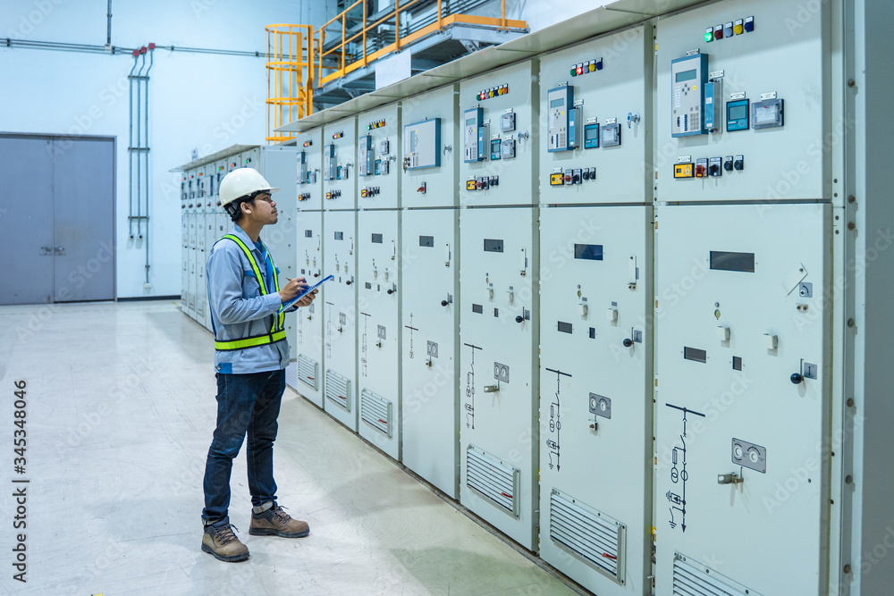 Fototapeta Engineer working and check status switchgear electrical